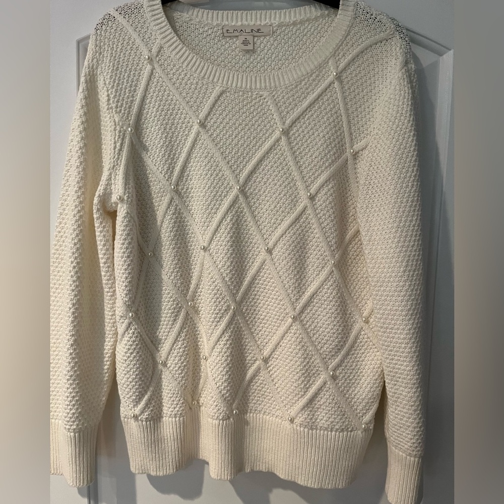 White sweater size medium, with diamond pattern and pearls.